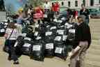 I guess the bags are supposed to suggest body bags?